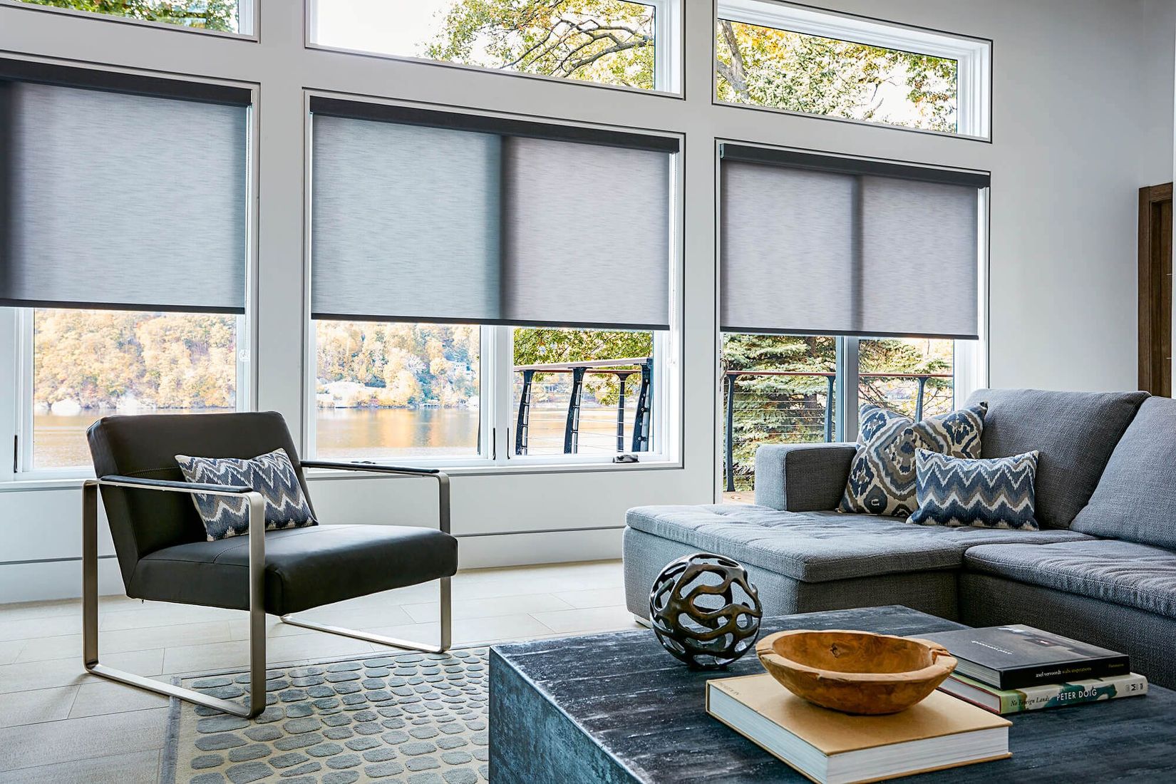 luxury roller shades on windows in a living room