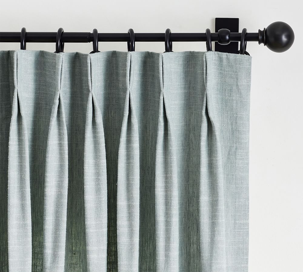 pinch pleat drapes hanging from rings